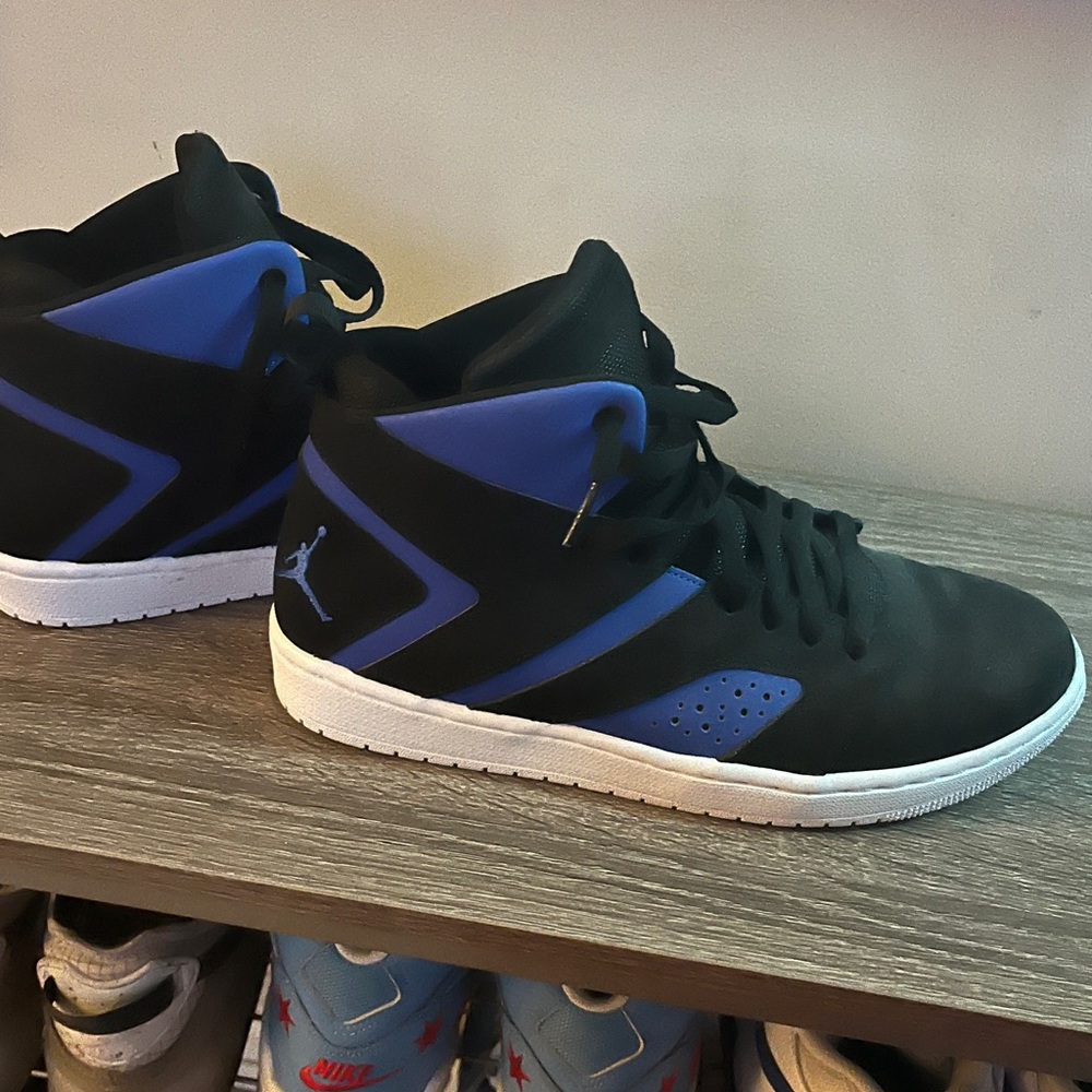 NWOT Nike Black and blue Air Jordan High Tops, Men’s Size 9.5